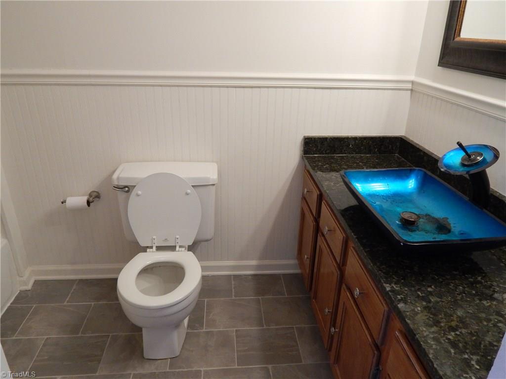 7830 Cherry Street Rural Hall, NC 27045 - Photo 12 of 21 Notice the wainscoting & pretty molding.