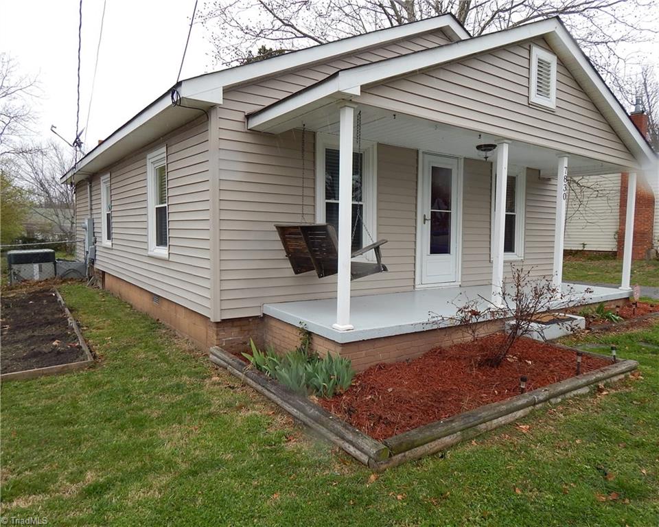 7830 Cherry Street Rural Hall, NC 27045 - Photo 16 of 21 Another view of the home, raised bed to the left is ready for your flowers or tomato plants!