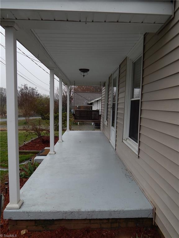 7830 Cherry Street Rural Hall, NC 27045 - Photo 17 of 21 Imagine your outdoor furniture and rocking chairs on the front porch!!! Hooks already in place for those hanging baskets!!