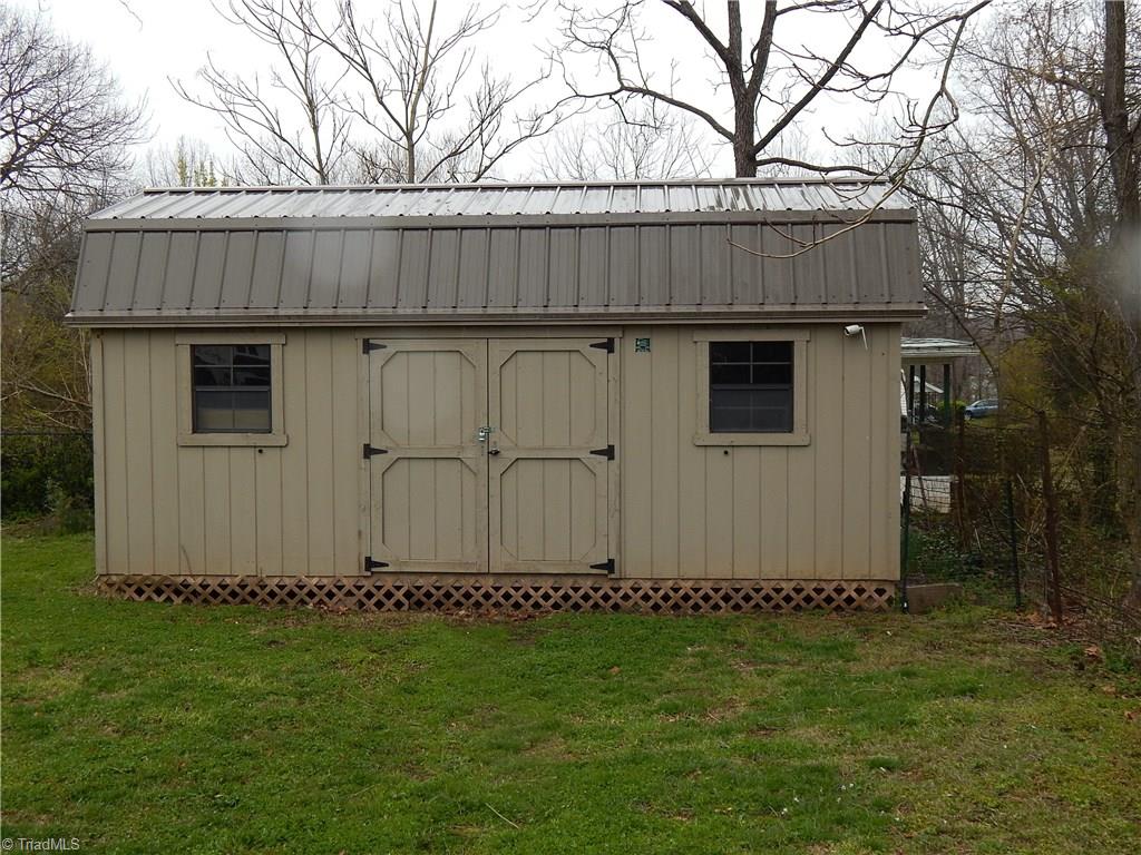 7830 Cherry Street Rural Hall, NC 27045 - Photo 21 of 21 Nice, large, storage building for the mower or make it a workshop!!!