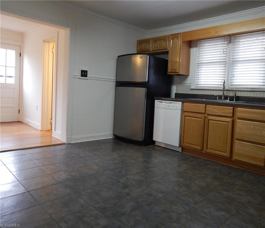 7830 Cherry Street Rural Hall, NC 27045 - Photo 6 of 21 Kitchen gets a lot of natural light from the bonus room!