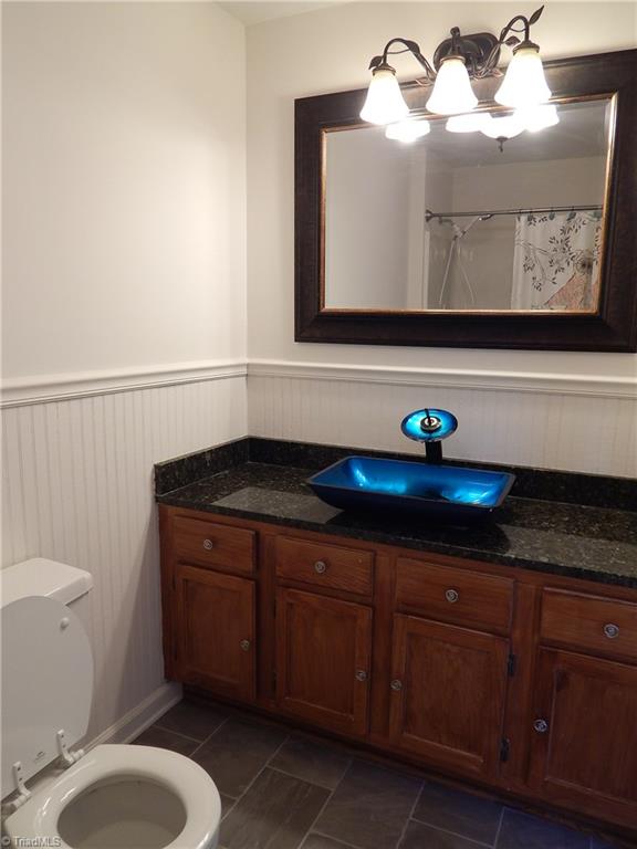 7830 Cherry Street Rural Hall, NC 27045 - Photo 10 of 21 New vinyl flooring, granite counter tops!!