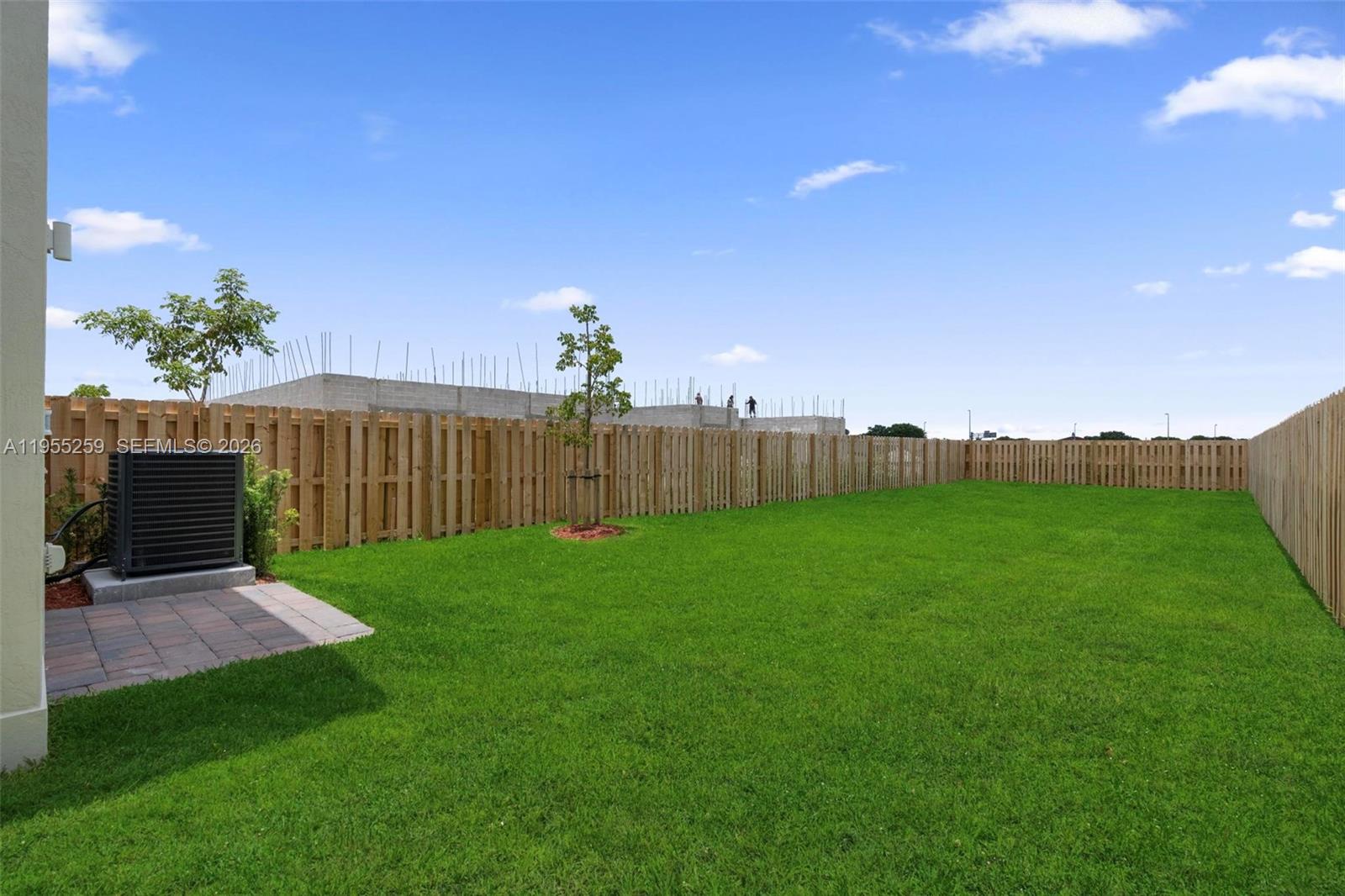 27319 Southwest 133rd Path Homestead, FL 33032 - Photo 30 of 32 a view of a backyard with green space