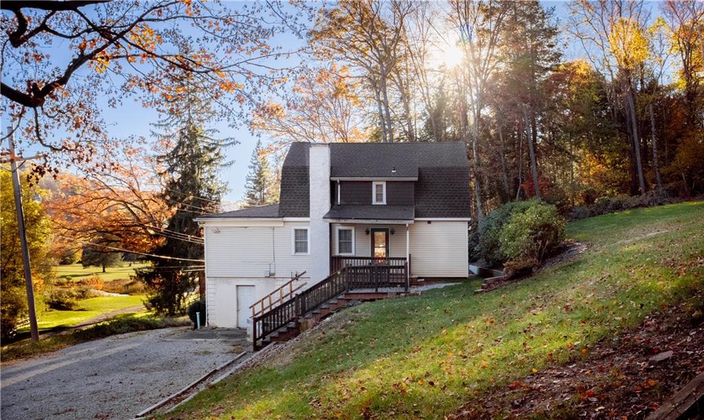 front view of house with a yard