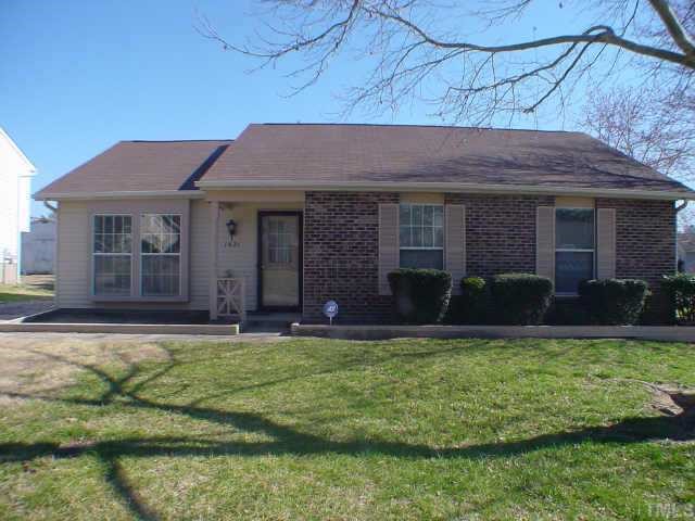 a house view with a garden space