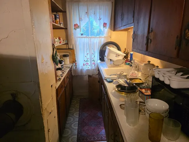 a bathroom with a sink toilet and mirror
