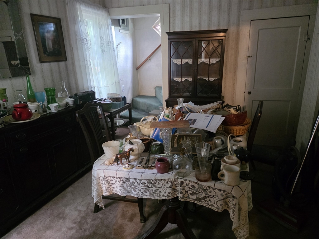929 Point Road Marion, MA 02738 - Photo 4 of 9 a dining room with furniture and wooden floor