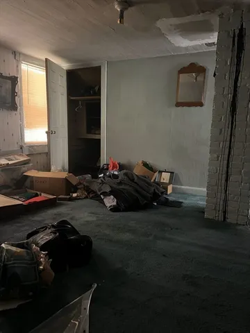 a room with furniture and a window