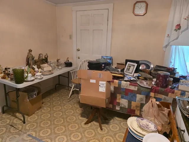 a bedroom with bed and a window