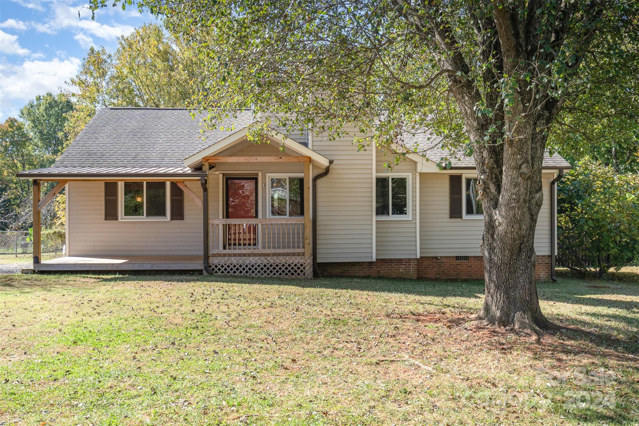a house with trees in front of it