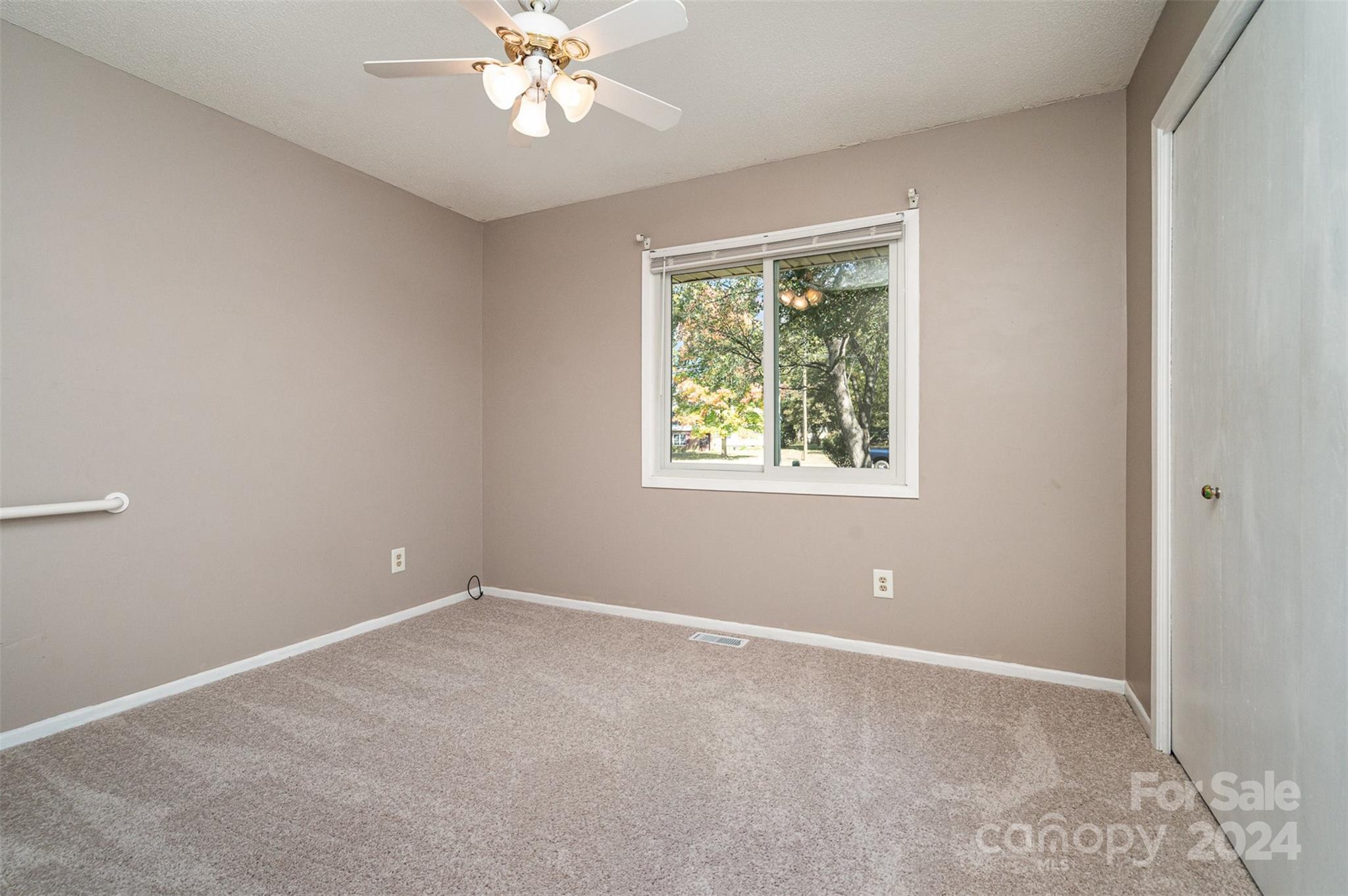 1316 Reid Harkey Road Matthews, NC 28105 - Photo 25 of 35 a view of an empty room with a window
