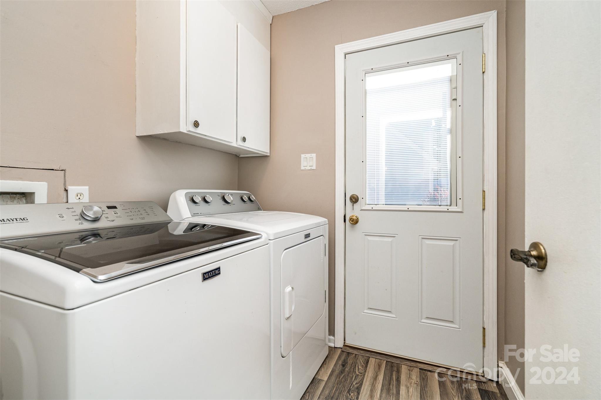 1316 Reid Harkey Road Matthews, NC 28105 - Photo 26 of 35 a kitchen that has a sink and a stove