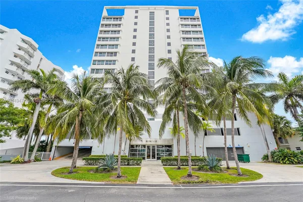 a view of a tall white building