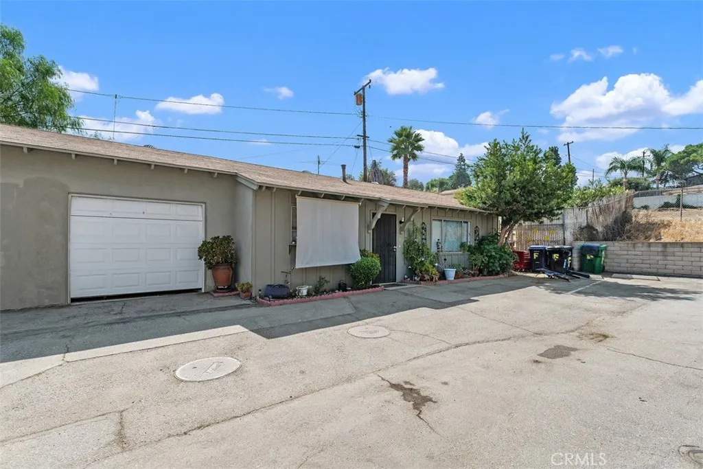 7979 Minnesota Road Corona, CA 92881 - Photo 6 of 9 a view of a house with a patio