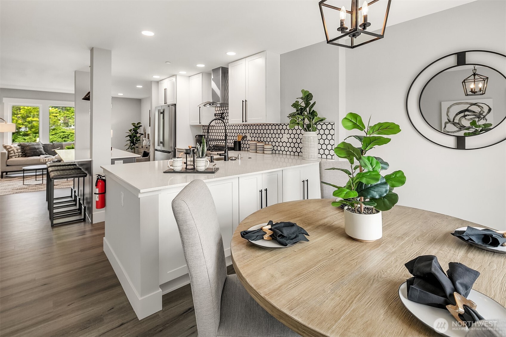 7528 215th Street Southwest, Unit 101 Edmonds, WA 98026 - Photo 11 of 29 a kitchen with a table and chairs