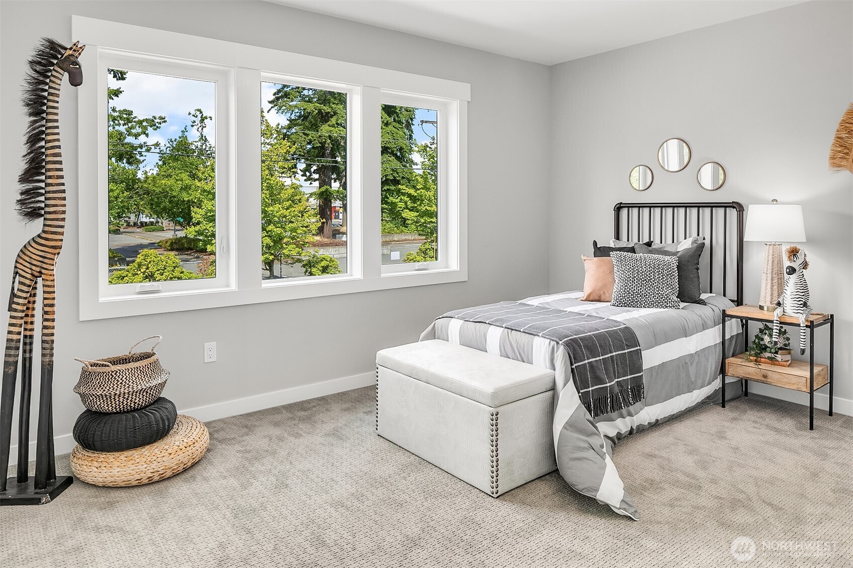 7528 215th Street Southwest, Unit 101 Edmonds, WA 98026 - Photo 13 of 29 a bedroom with a bed and a window