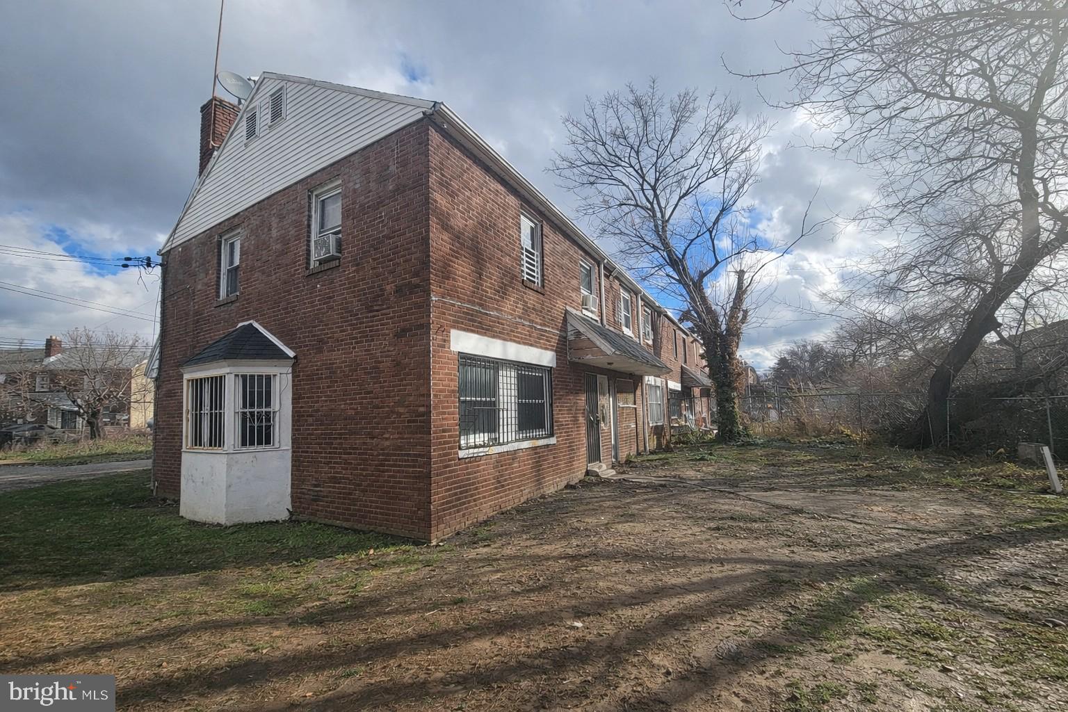 1438 Perkins Street Chester, PA 19013 - Photo 10 of 10 a view of a house with a yard