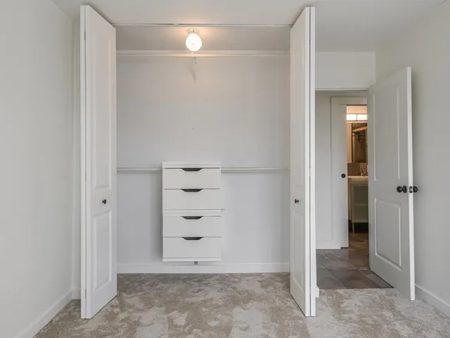 a view of a bathroom with a glass door