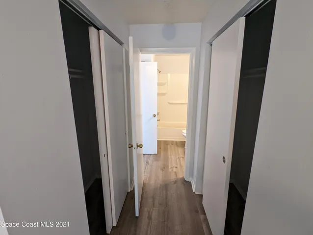 a view of a bathroom from a door