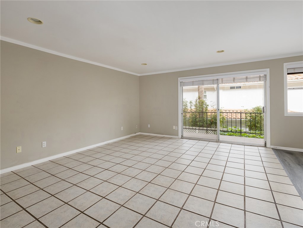 2015 Bataan Road, Unit 105 Redondo Beach, CA 90278 - Photo 4 of 29 a view of an empty room and window
