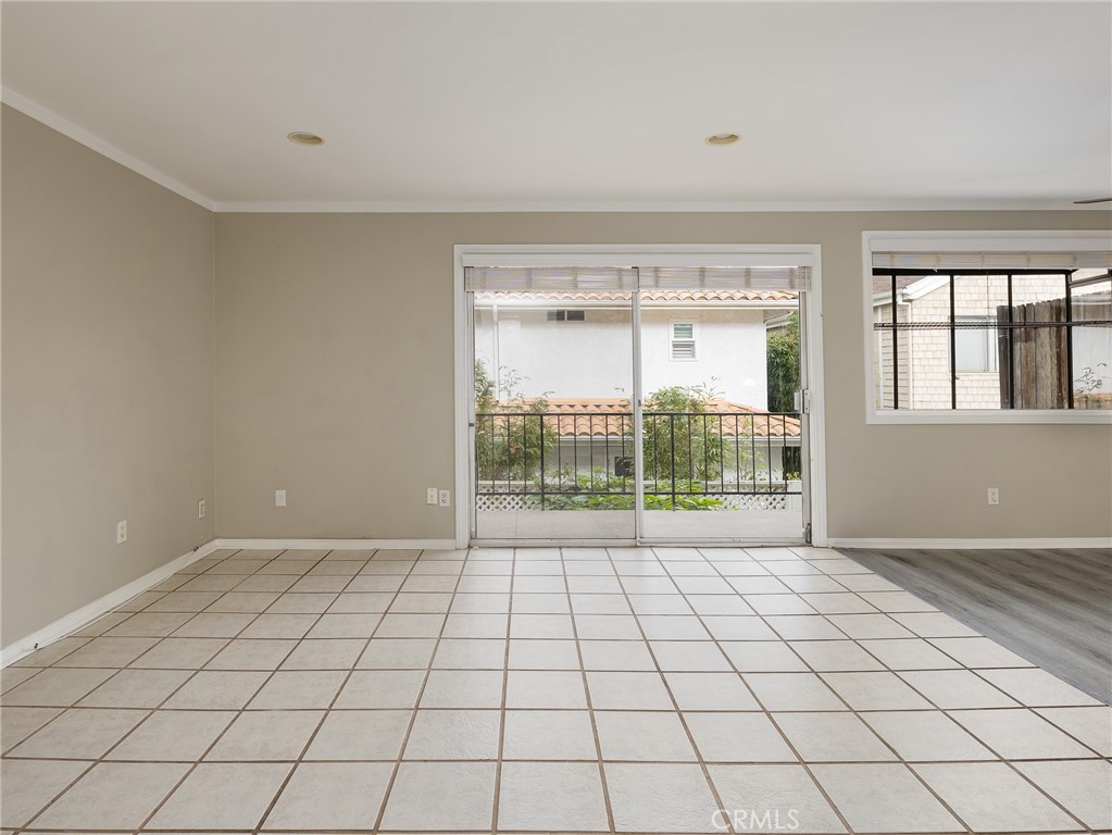 2015 Bataan Road, Unit 105 Redondo Beach, CA 90278 - Photo 6 of 29 a view of an empty room and window