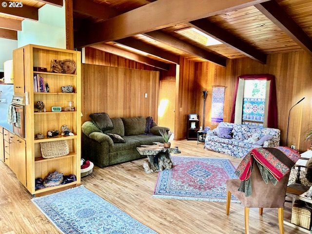 766 Foothill Drive Eugene, OR 97405 - Photo 4 of 12 a living room with furniture a rug and wall painting