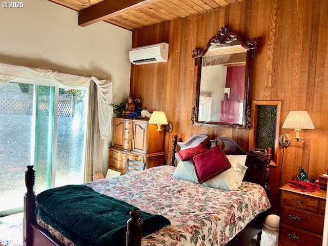 766 Foothill Drive Eugene, OR 97405 - Photo 6 of 12 a bedroom with a bed and dresser with mirror