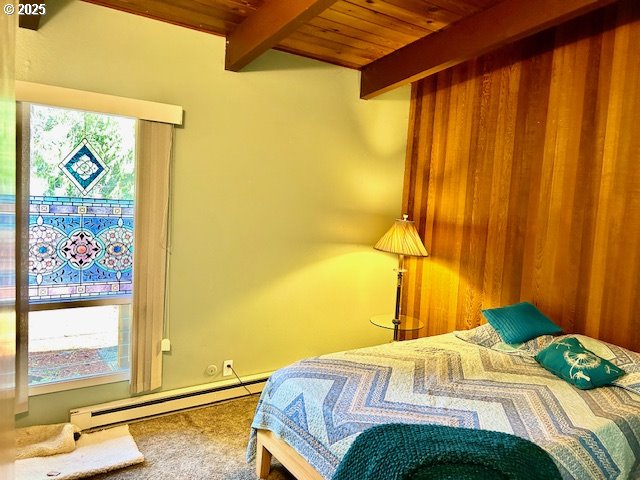 766 Foothill Drive Eugene, OR 97405 - Photo 9 of 12 a bedroom with a bed and a window