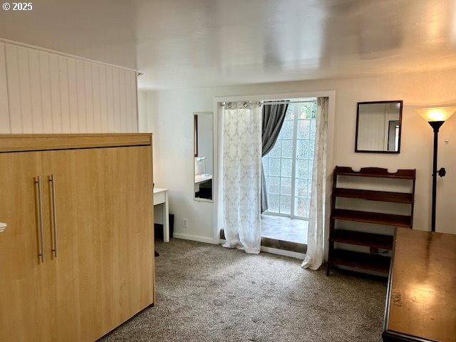 766 Foothill Drive Eugene, OR 97405 - Photo 10 of 12 a view of room with furniture and a refrigerator