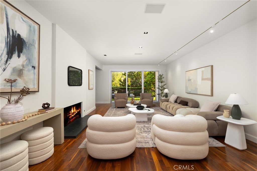 598 Camillo Road Sierra Madre, CA 91024 - Photo 8 of 75 a living room with furniture kitchen view and a large window