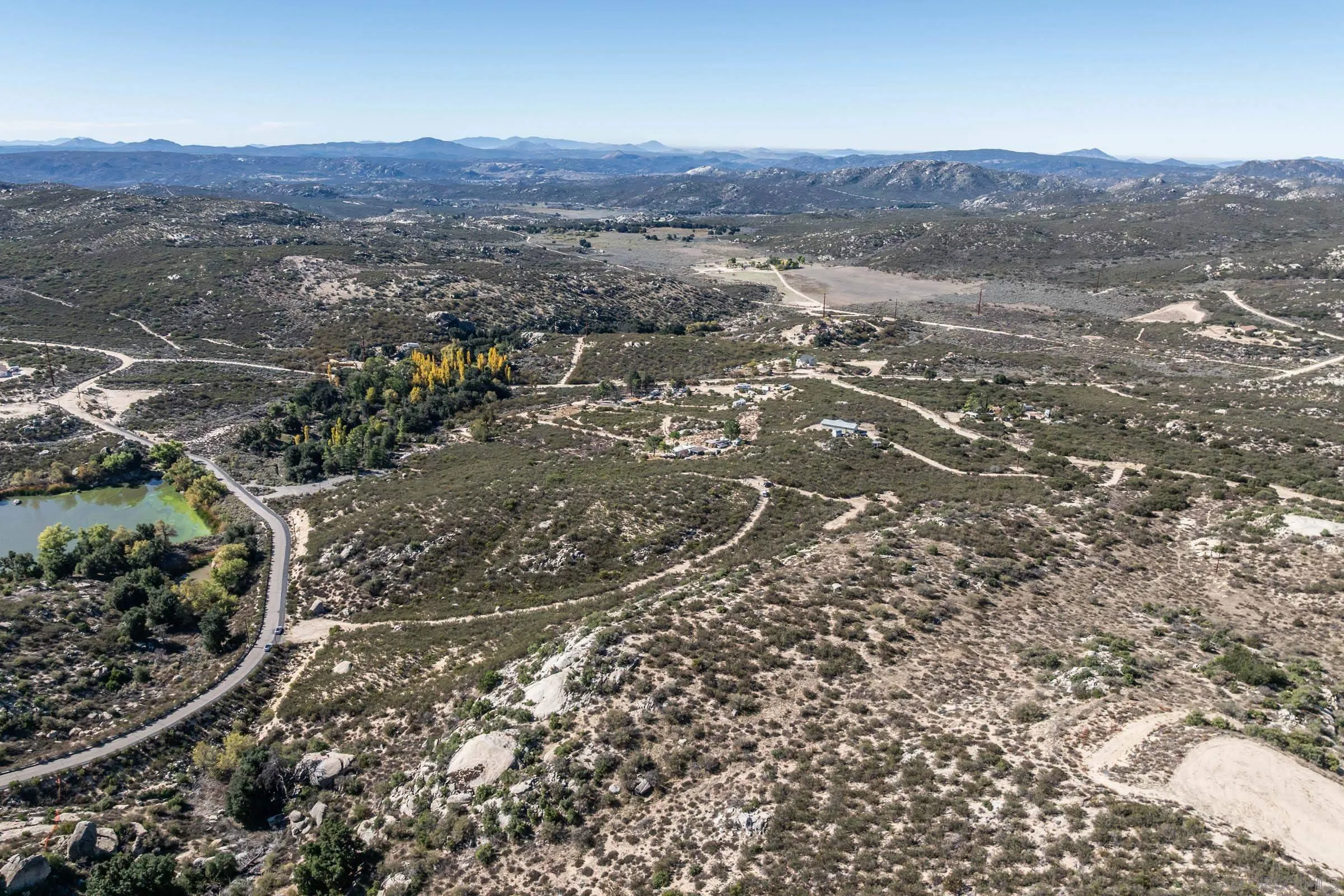 35613 Stagecoach Springs Road, Unit 466 Pine Valley, CA 91962 - Photo 14 of 28 a view of a lush green field with lots of bushes