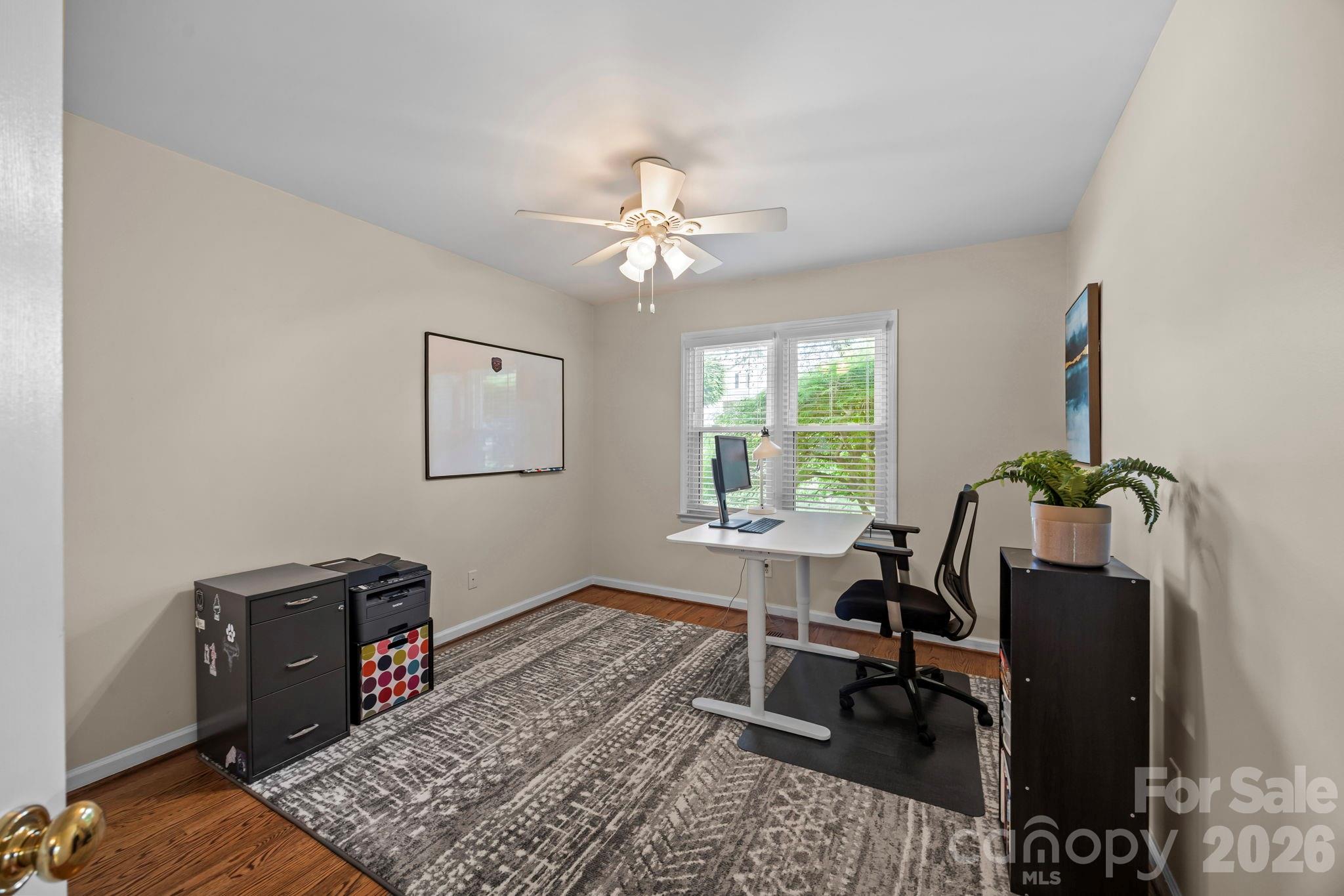 413 Nixon Road Belmont, NC 28012 - Photo 20 of 48 a view of a workspace with furniture and a window