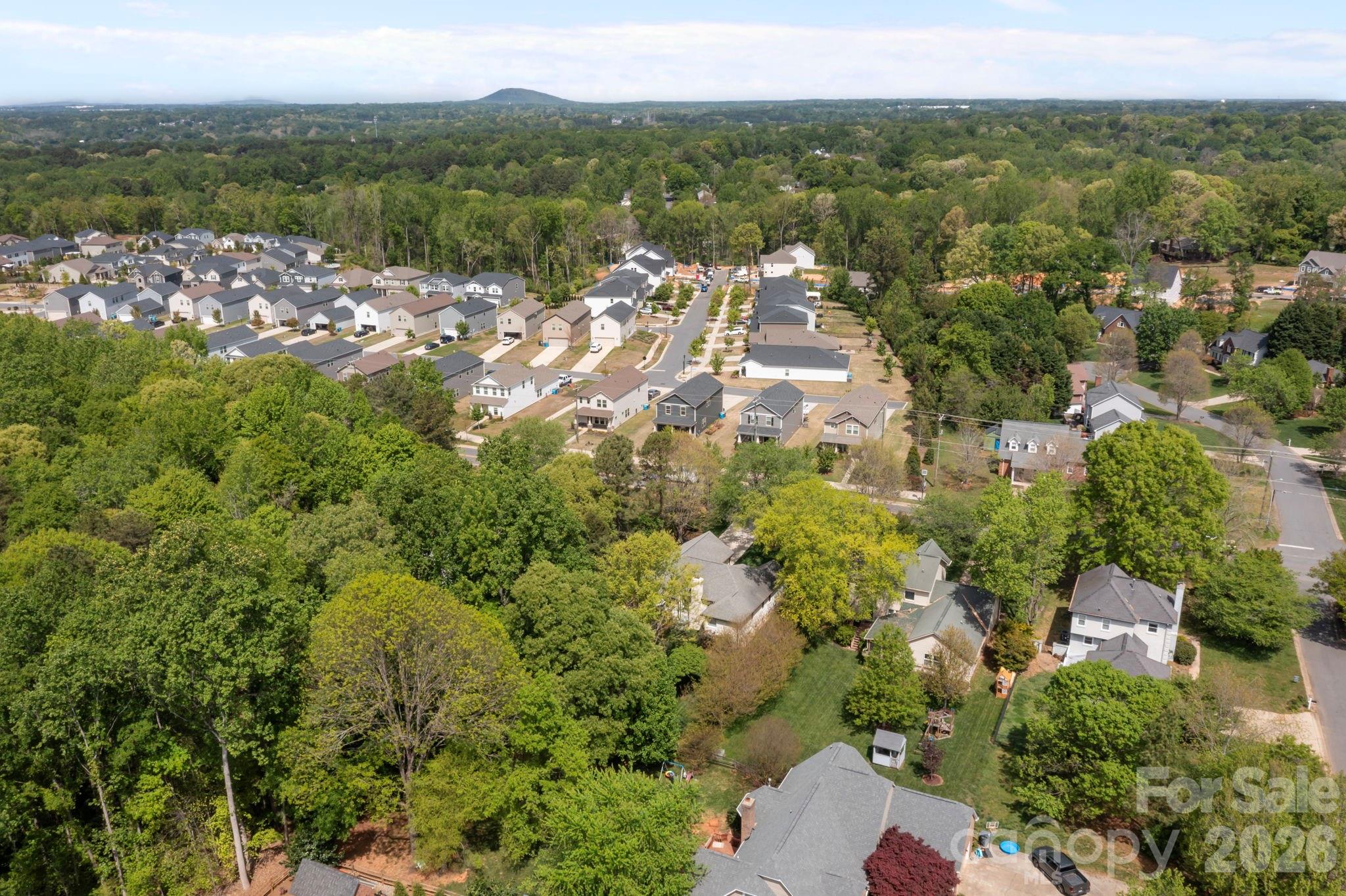 413 Nixon Road Belmont, NC 28012 - Photo 48 of 48 an aerial view of residential houses with outdoor space and trees