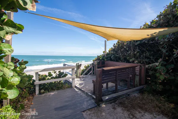 a view of a balcony with an outdoor space