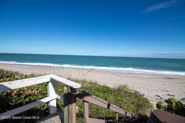 a view of ocean from a balcony