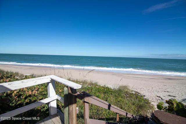 a view of ocean from a balcony
