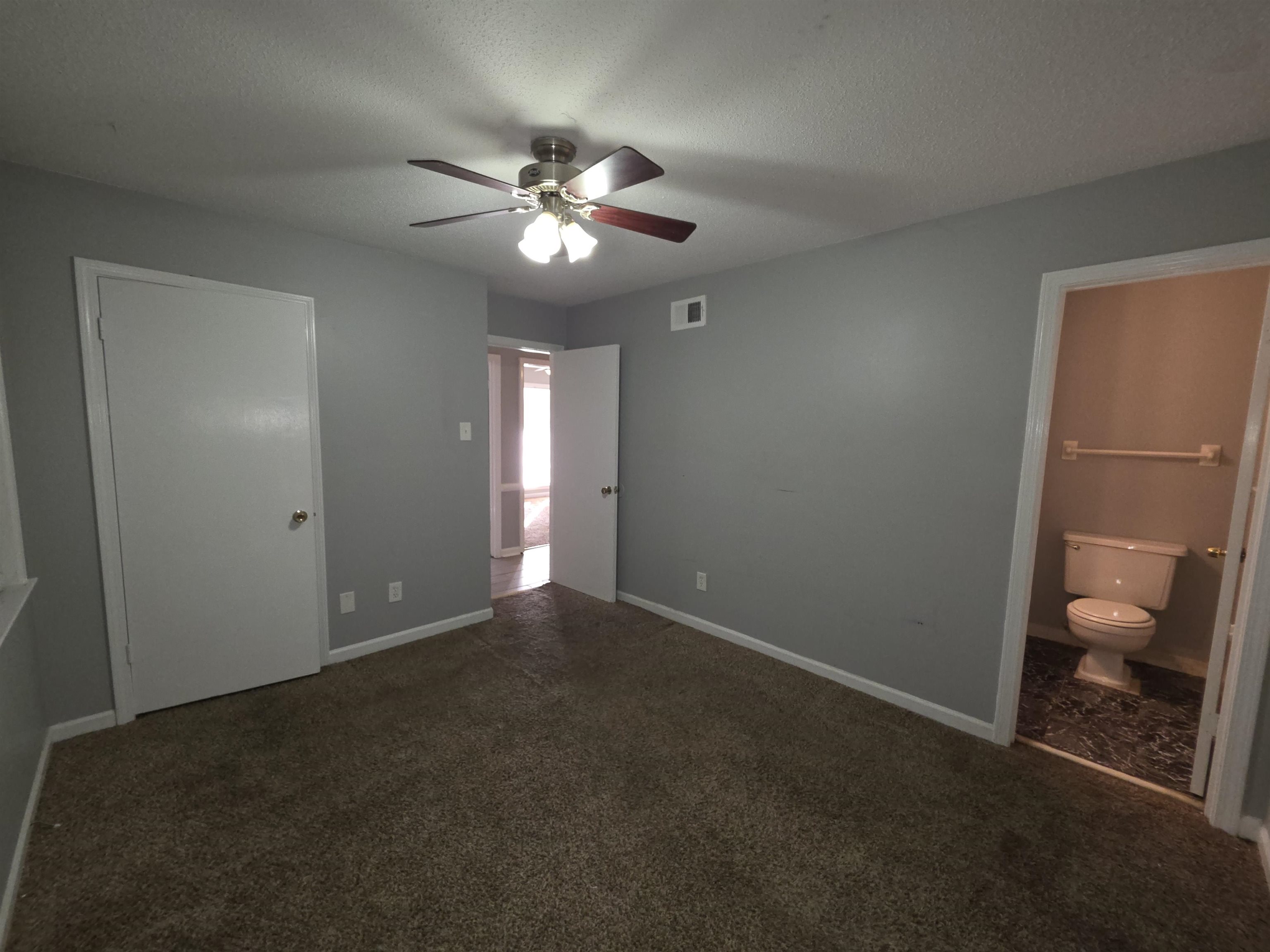 936 Chesterton Drive Memphis, TN 38127 - Photo 22 of 28 a view of an empty room with a fan