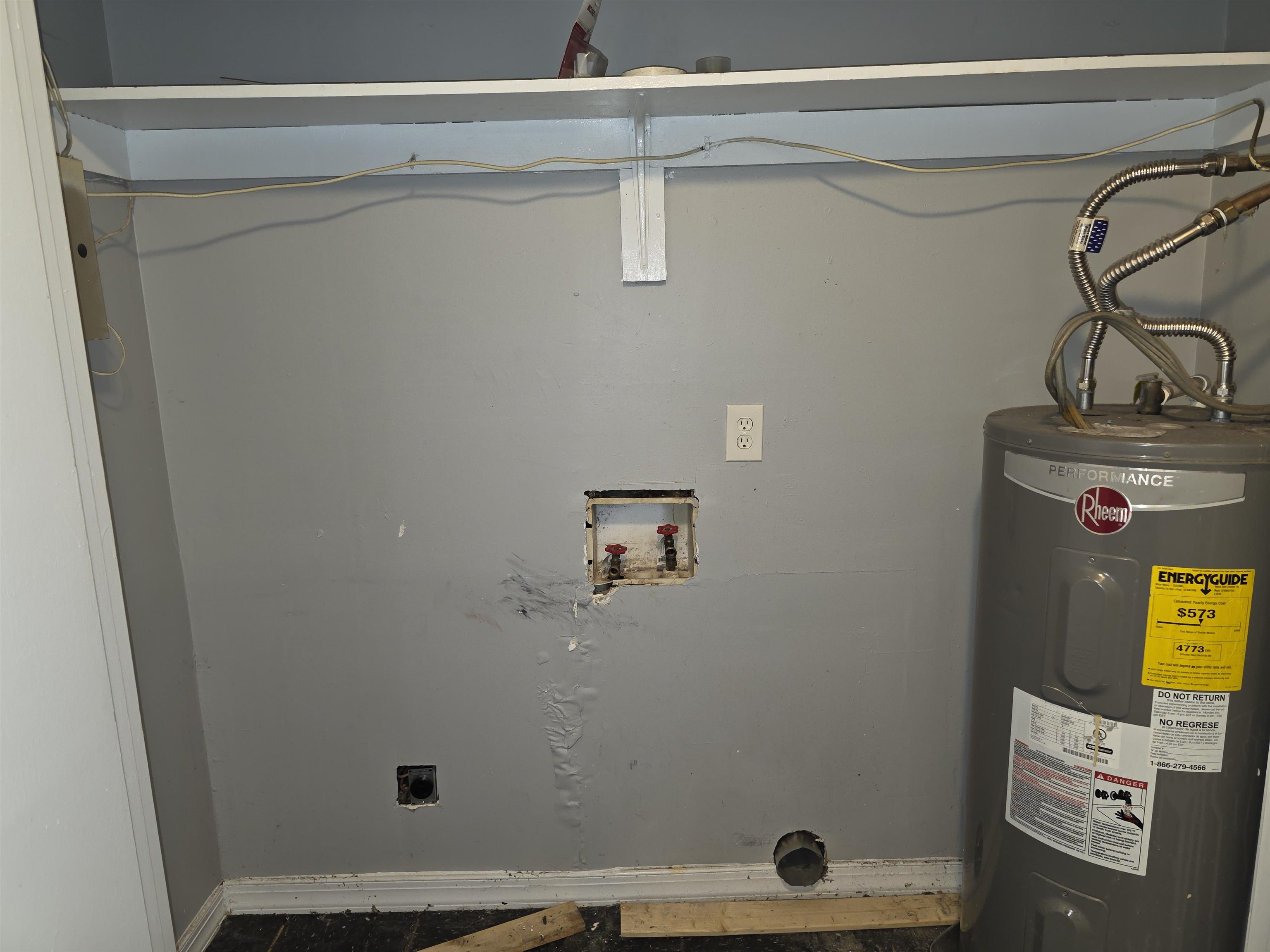 936 Chesterton Drive Memphis, TN 38127 - Photo 10 of 28 a view of storage and utility room with racks on the wall