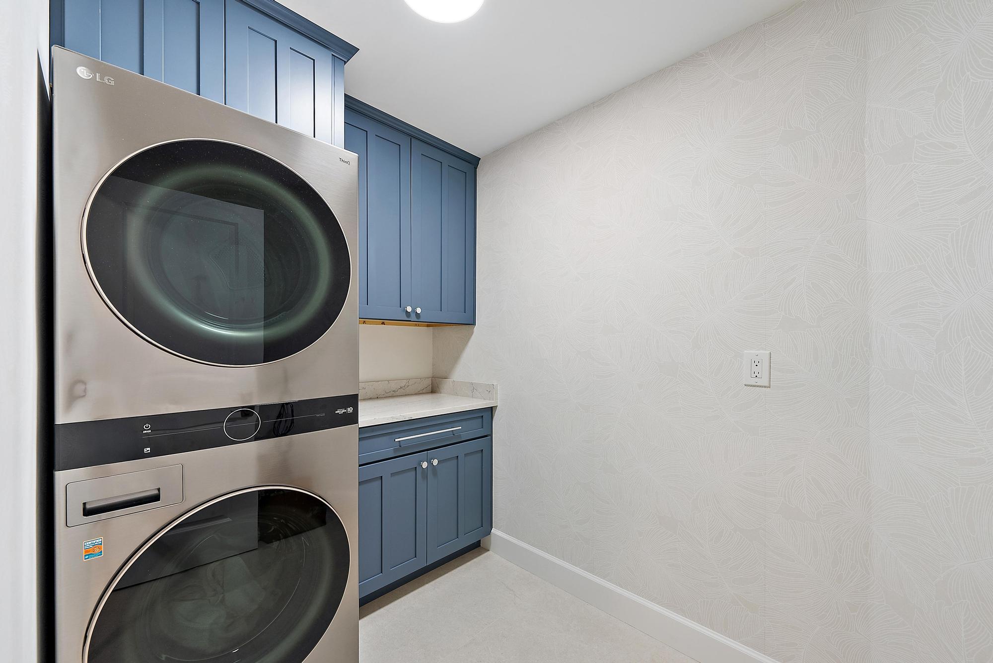 19 Island Road Sewall's Point, FL 34996 - Photo 35 of 50 a storage room with washer and dryer