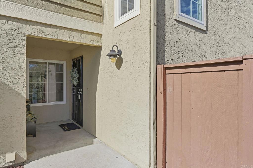 2972 Lancaster Road Carlsbad, CA 92010 - Photo 3 of 36 a view of a hallway with a glass door and a window