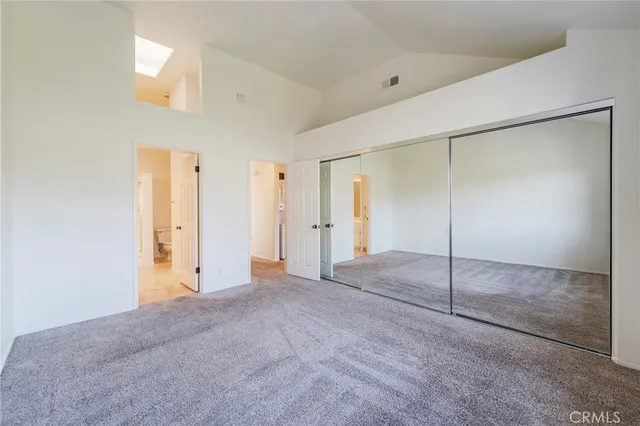 a bathroom with a double vanity sink mirror and double