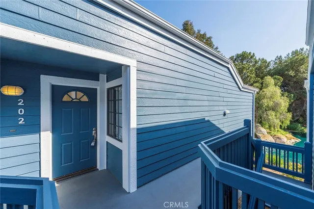 a spacious bathroom with a double vanity sink and mirror