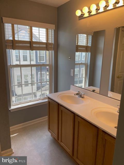 8 Swan Court Delran, NJ 08075 - Photo 11 of 12 a bathroom with a sink and a window