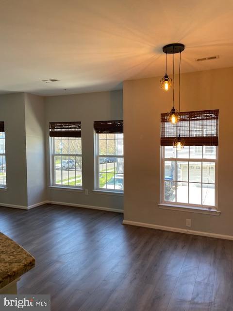 8 Swan Court Delran, NJ 08075 - Photo 4 of 12 a view of an empty room with wooden floor and a window