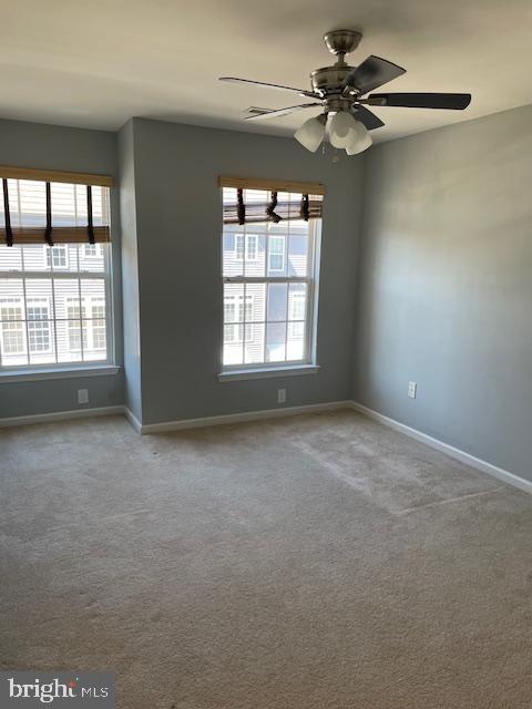 8 Swan Court Delran, NJ 08075 - Photo 5 of 12 a view of a livingroom with a ceiling fan and window