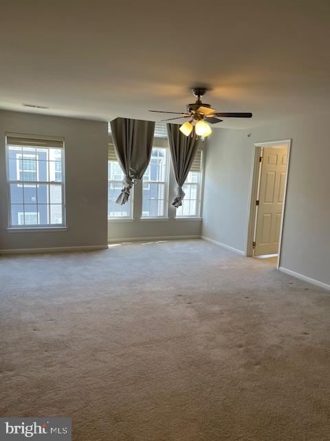 8 Swan Court Delran, NJ 08075 - Photo 8 of 12 a view of a livingroom with a ceiling fan and window