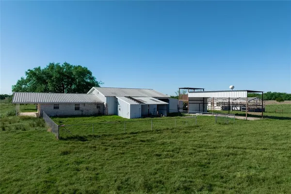 a house view with a play ground