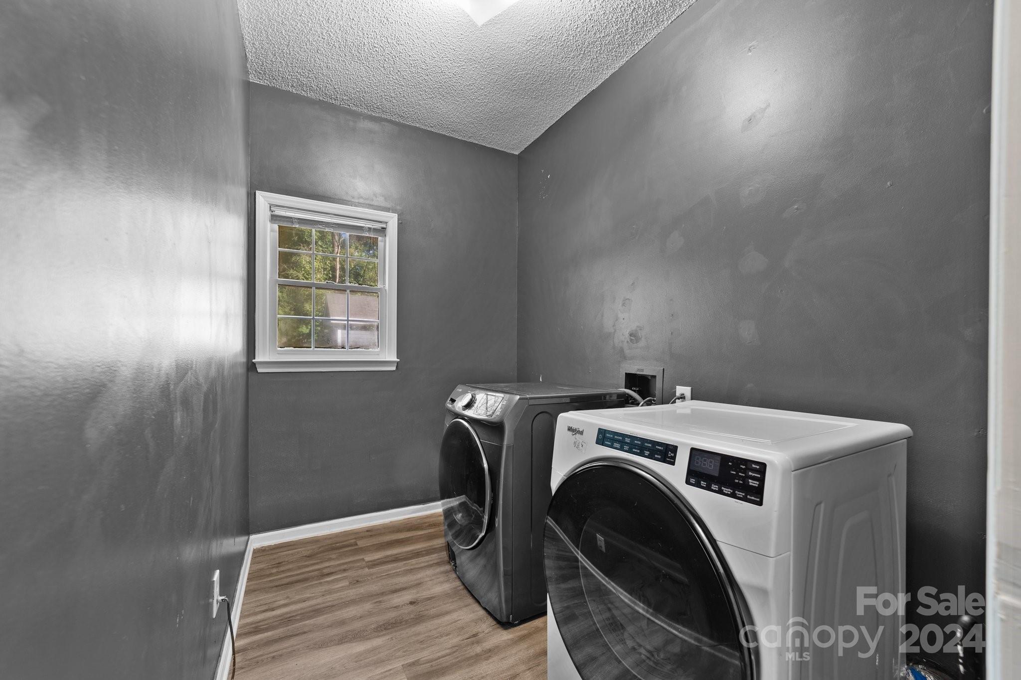 1041 Fairway Ridge Drive Northwest Concord, NC 28027 - Photo 22 of 44 a utility room with dryer and washer