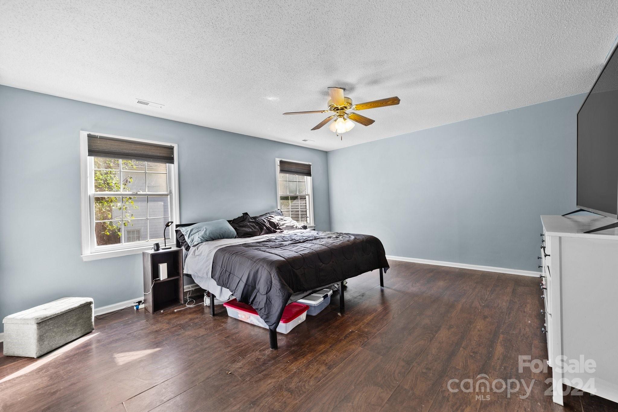 1041 Fairway Ridge Drive Northwest Concord, NC 28027 - Photo 23 of 44 a bedroom with a bed and a window