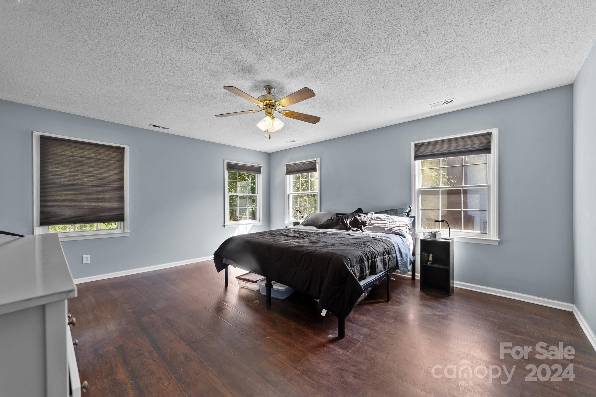 1041 Fairway Ridge Drive Northwest Concord, NC 28027 - Photo 24 of 44 a bedroom with a bed and a window